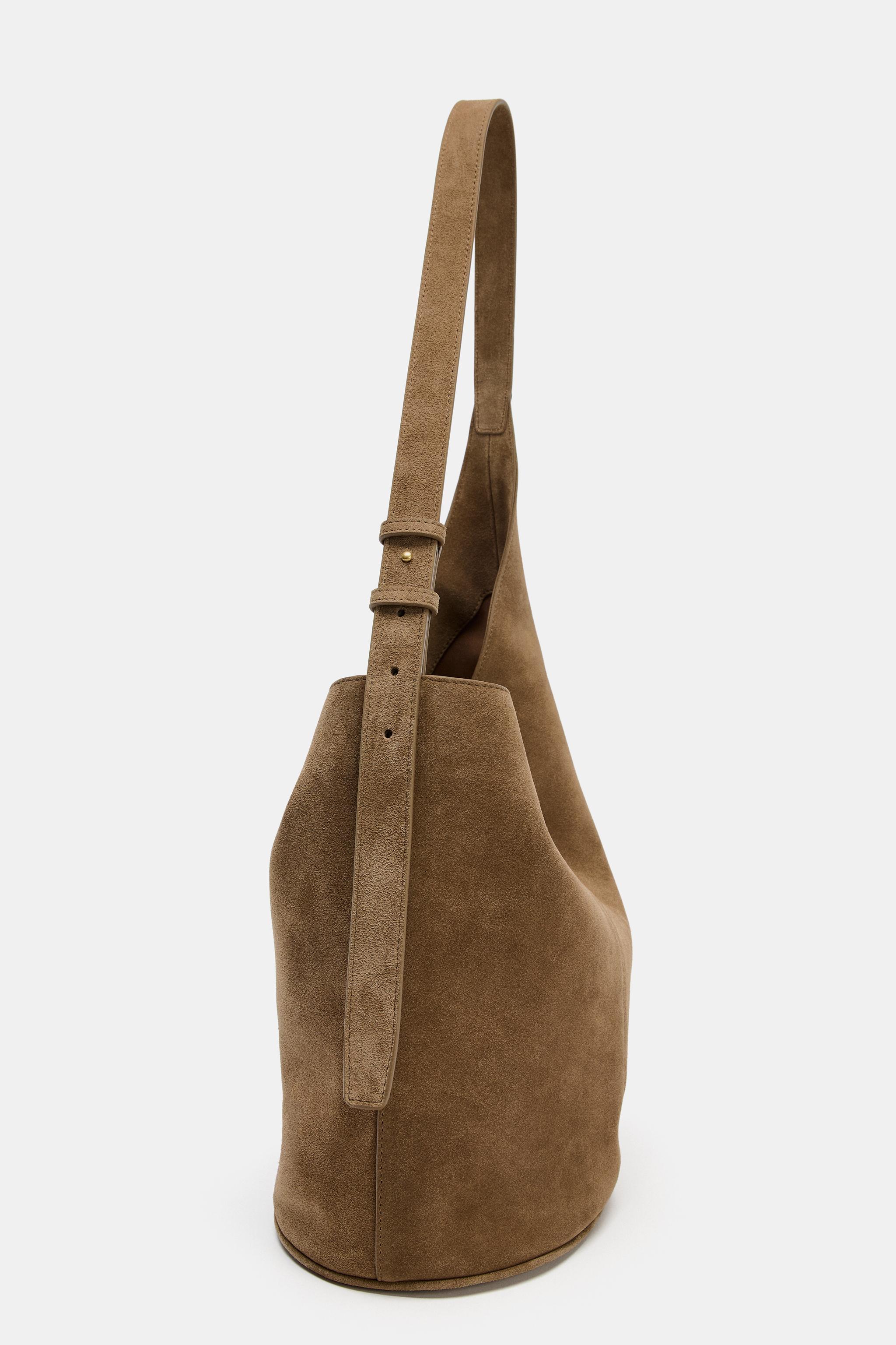 ASYMMETRIC LEATHER BUCKET BAG